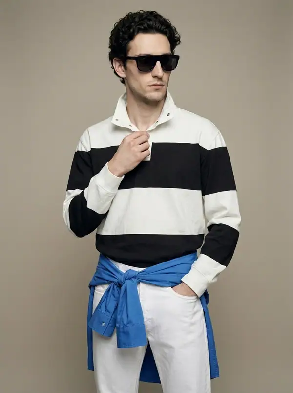 black-white stripe rugby, snap funnel collar worn by an AI male model, studio shoot