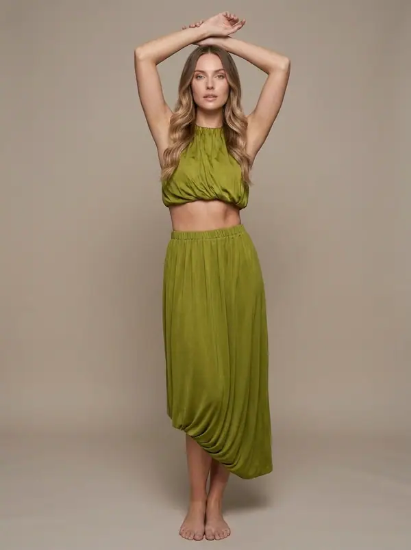 chartreuse gathered crop + drape-hem midi set worn by an AI model, studio shoot