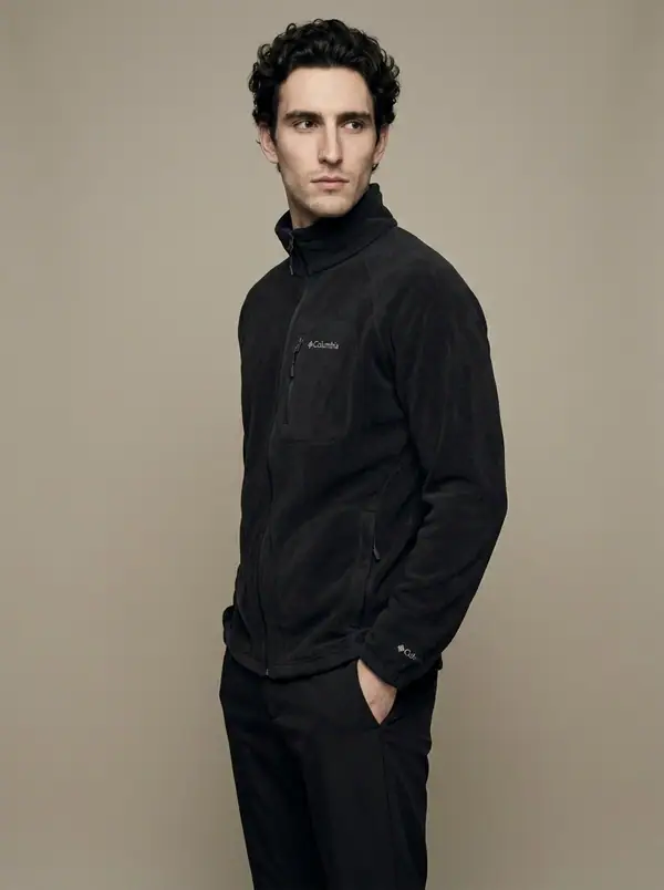 columbia black fleece pair, full-zip + quarter-zip worn by an AI male model, studio shoot