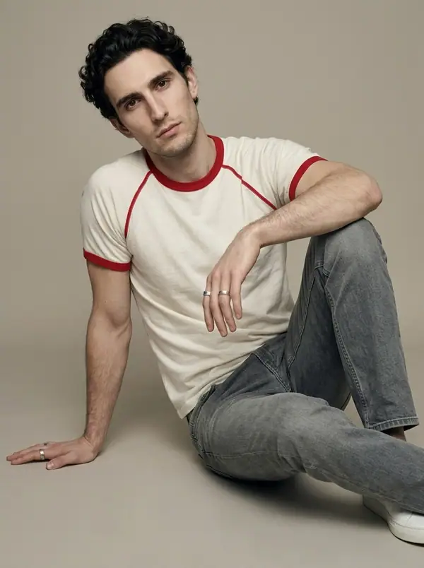 off-white ringer tee, red contrast trims worn by an AI male model, studio shoot