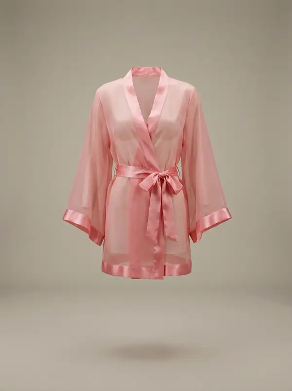 short pink chiffon kimono robe, satin trim and tie belt, photographed as a product shot on a studio sweep